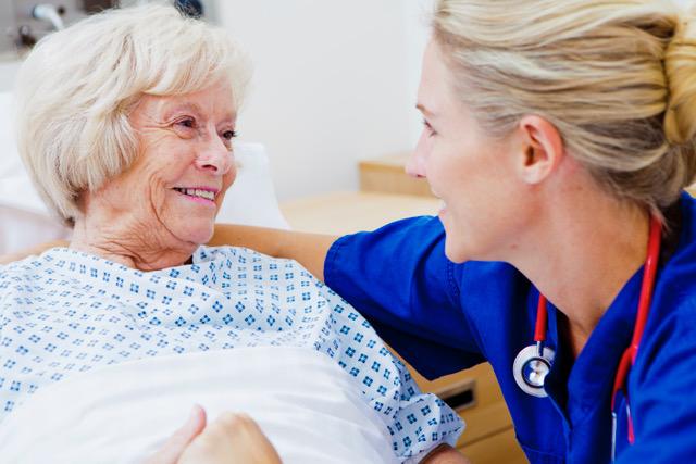 nurse caring for patient